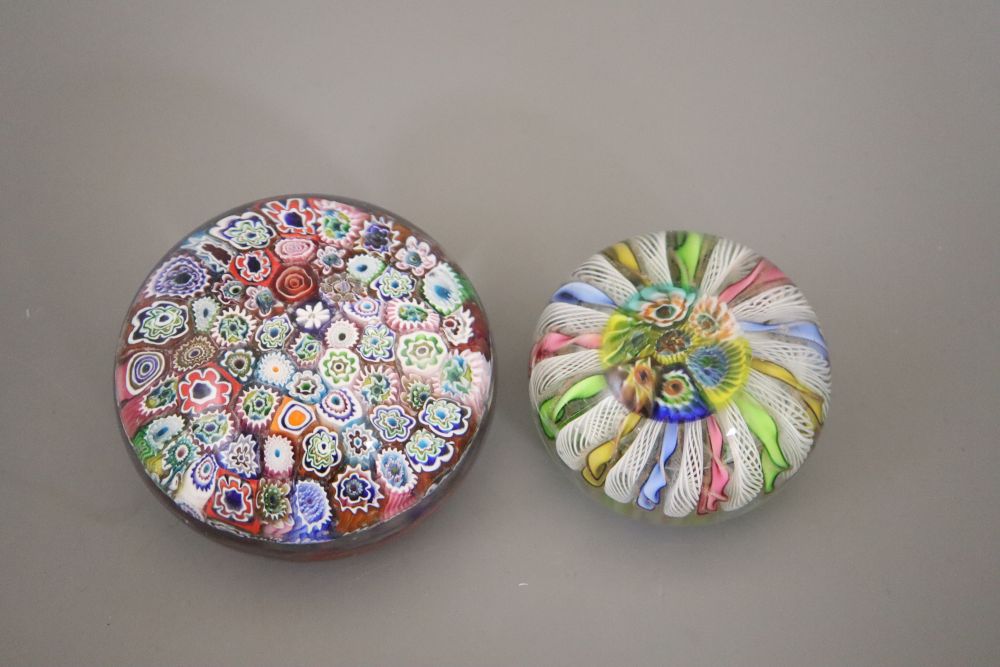 A millefiore paperweight and another paperweight